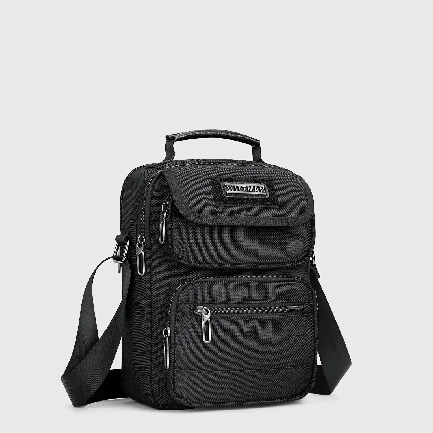 WITZMAN men’s black nylon crossbody sling bag with multiple compartments and iPad pocket B710