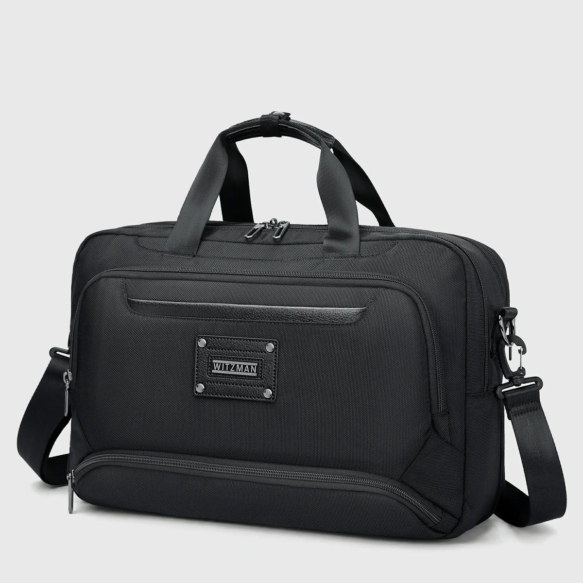 Black expandable work briefcase with side zipper panel increasing storage depth from approximately 7 to 9 inches