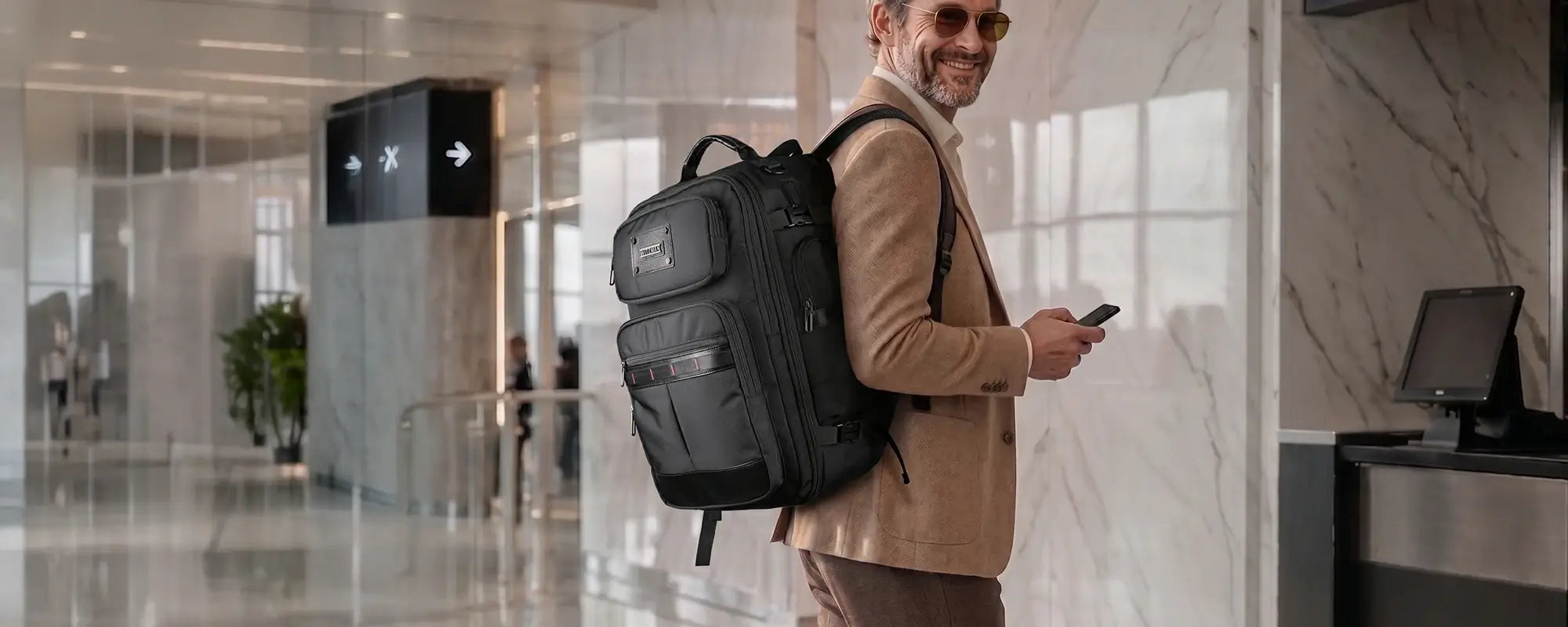 WITZMAN Elite premium travel backpacks for men with structured organization for business trips and carry-on travel