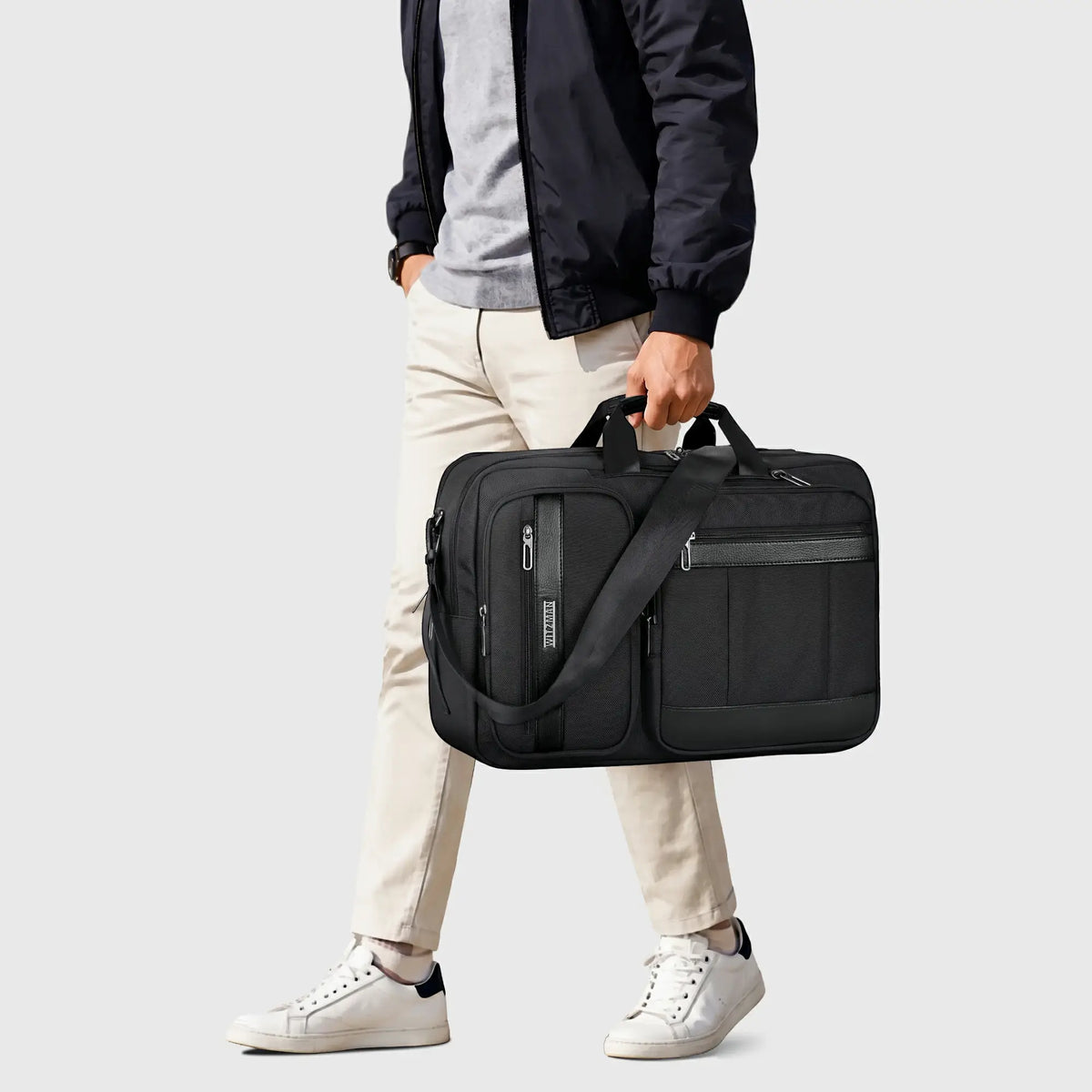 Professional laptop messenger backpack for men with water-resistant nylon exterior and PU leather handles