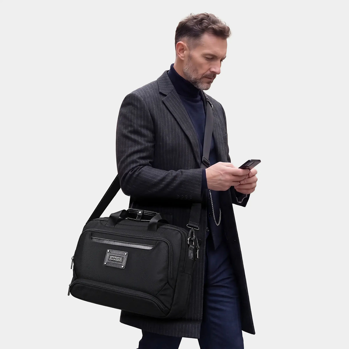 Men's laptop shoulder bag with adjustable padded strap for daily office commuting, business travel, and hands-free carrying