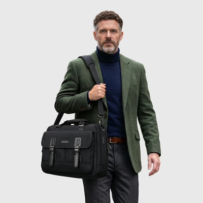 Classic business briefcase with double-buckle front flap, PU leather accents, and secure organizer pockets