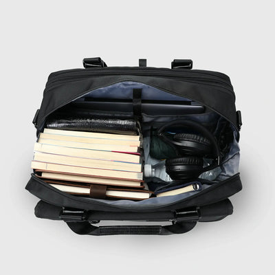 Large laptop briefcase for men showing two organized storage compartments for a 15.6-inch laptop, documents, and travel essentials