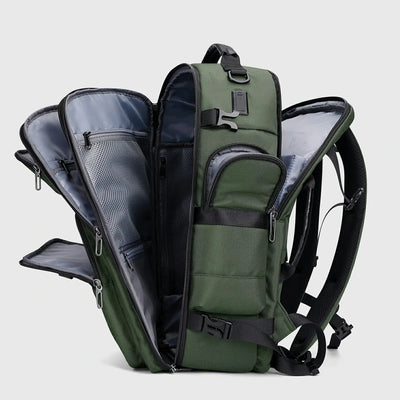 Army green multifunctional travel backpack showing layered compartments and access points