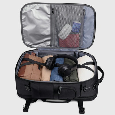 Black business travel backpack with independent 16 inch laptop and tablet compartment open