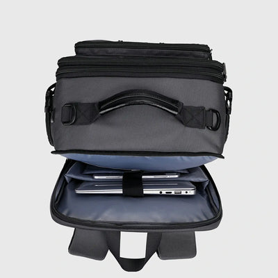 Silver grey travel backpack with front organizer open for documents and daily essentials