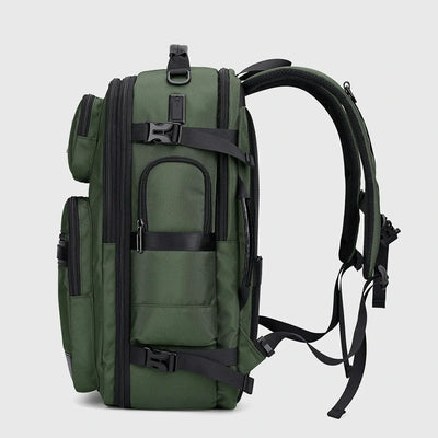 Side view of army green nylon travel backpack with USB charging ports and padded straps