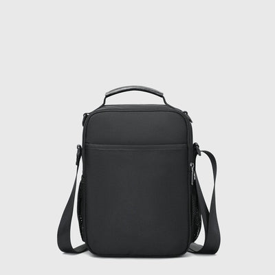Compact travel crossbody bag for men with iPad compartment side mesh pockets and front organizers