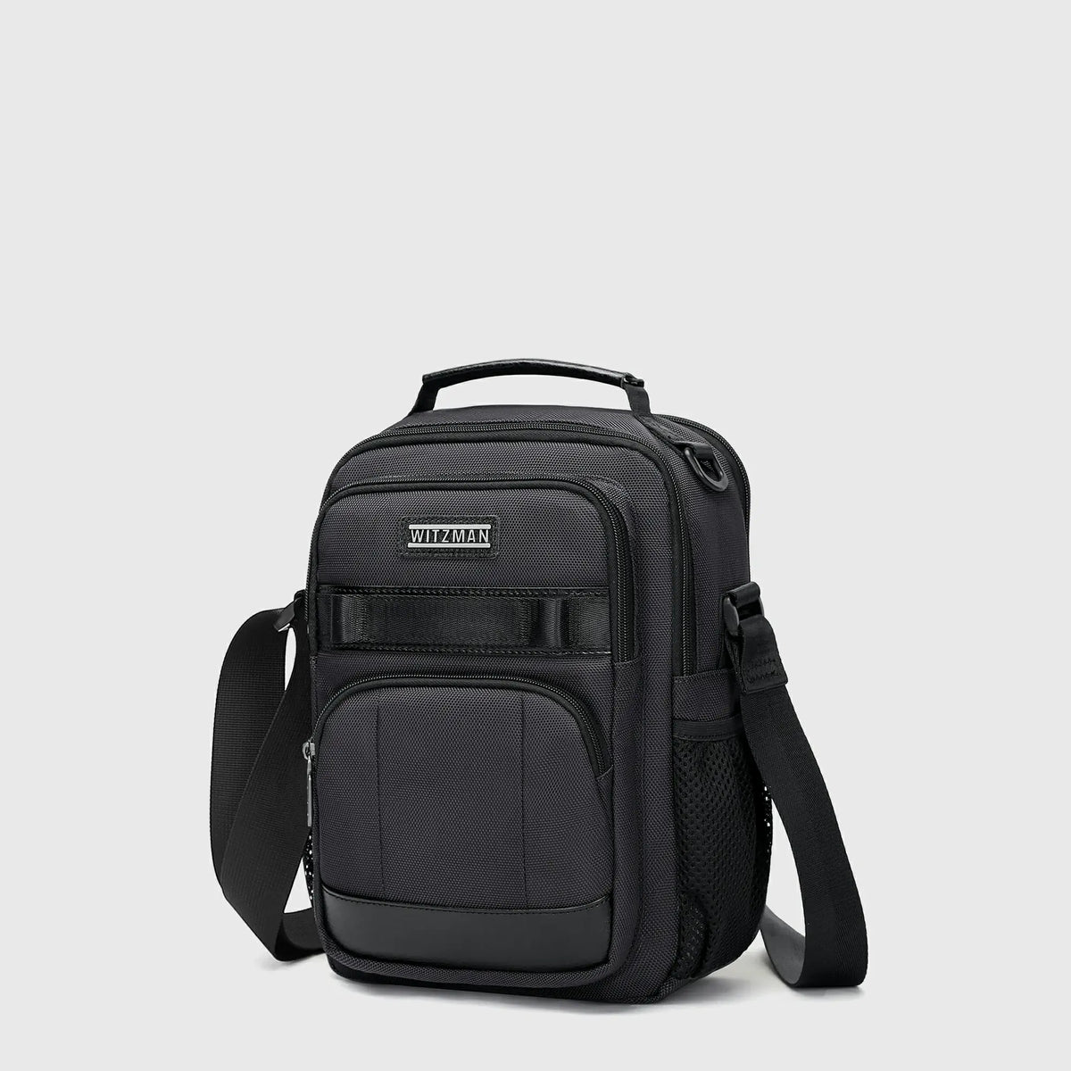 Black nylon crossbody bag for men with 11-inch iPad compartment and organized everyday storage