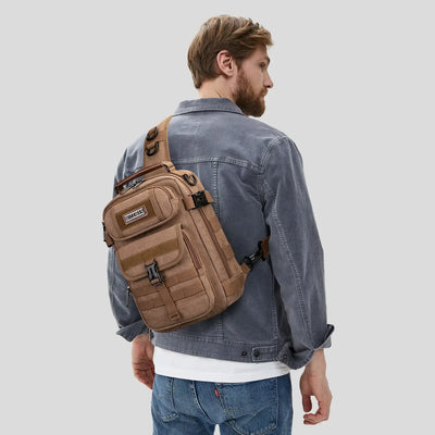 Casual men’s canvas sling bag with tactical webbing, padded iPad sleeve, and anti-theft pocket. Ideal for daily carry, travel, and city commuting.-brown a8021 witzman