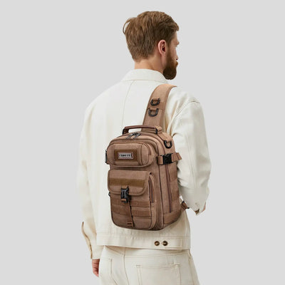 Casual men’s canvas sling bag with tactical webbing, padded iPad sleeve, and anti-theft pocket. Ideal for daily carry, travel, and city commuting.-brown a8021 witzman