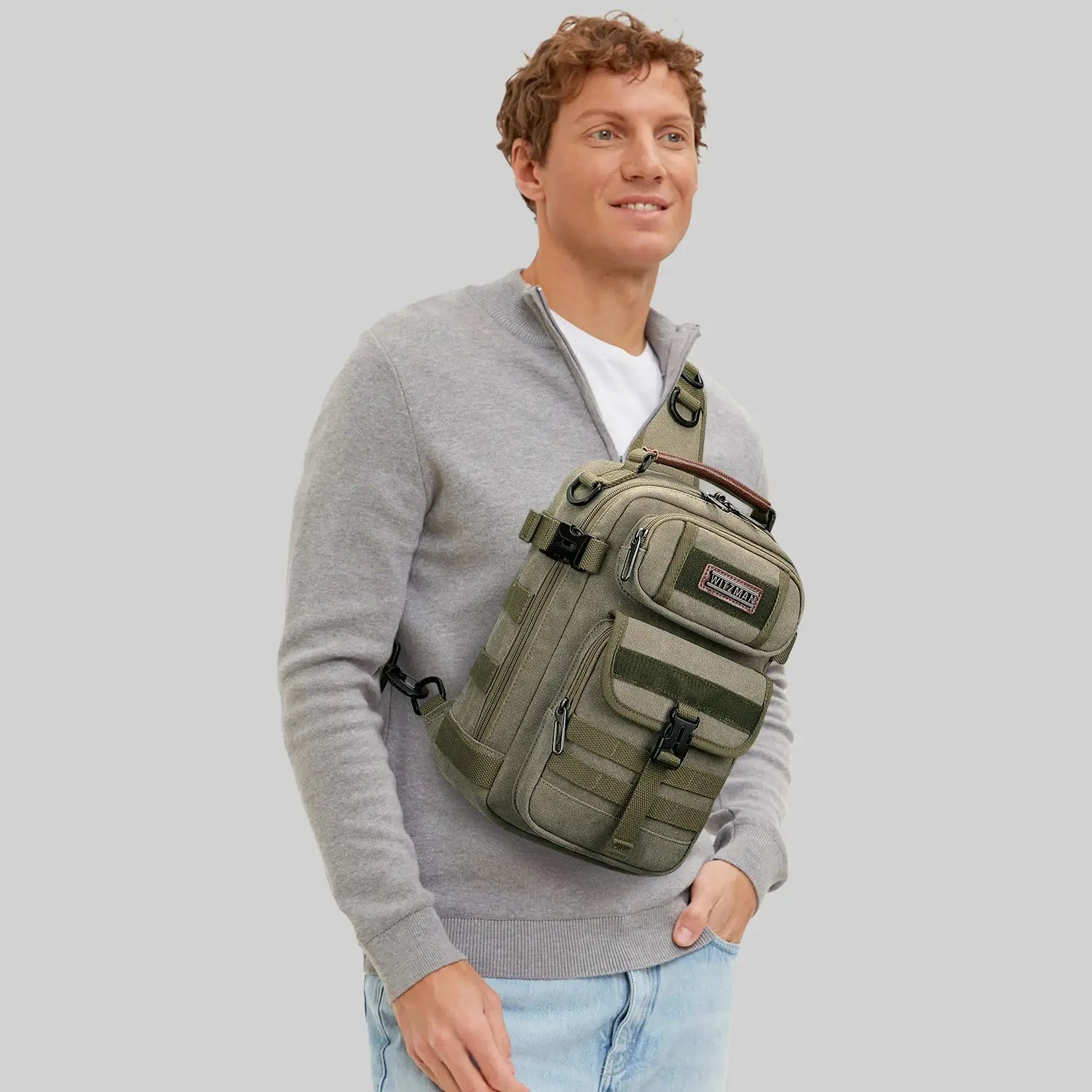 Casual men’s canvas sling bag with tactical webbing, padded iPad sleeve, and anti-theft pocket. Ideal for daily carry, travel, and city commuting.-green bag a8021 witzman