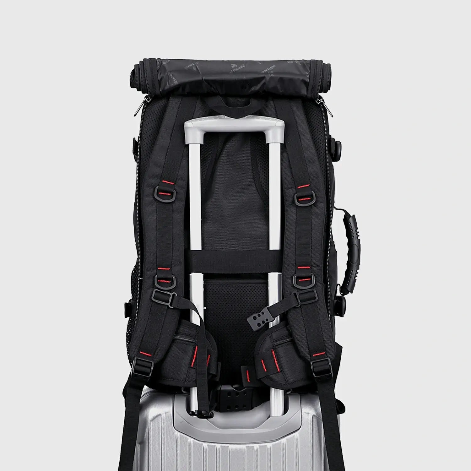 Black 3 in 1 travel backpack with shoulder straps stored for convertible carry