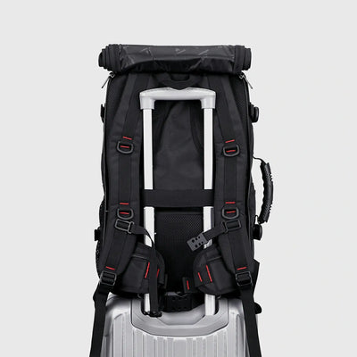 Black 3 in 1 travel backpack with shoulder straps stored for convertible carry