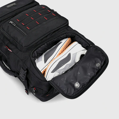 Close-up of separate shoe compartment in black men’s weekend travel backpack