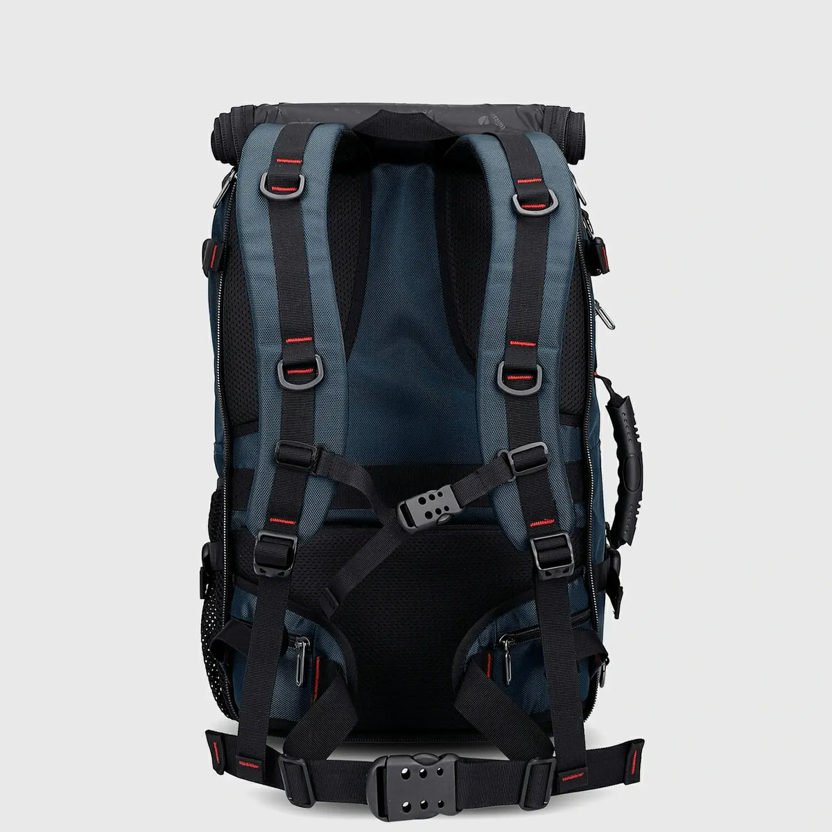 Back view of blue travel backpack with padded shoulder straps, chest strap and waist belt