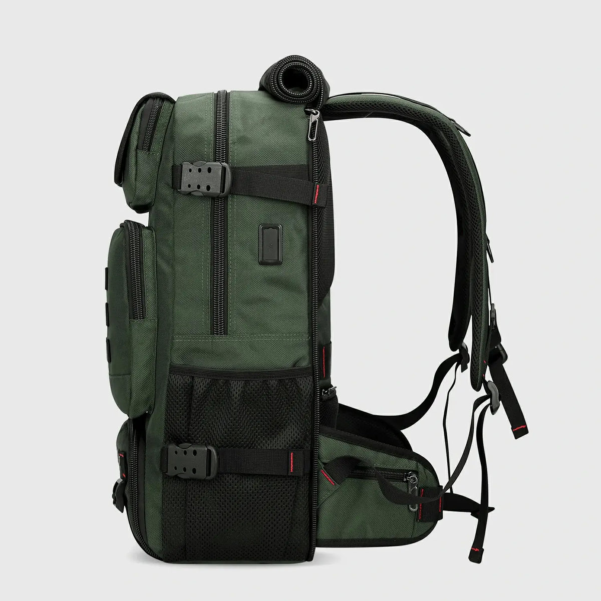 Side view of army green nylon travel backpack with USB port and compression straps