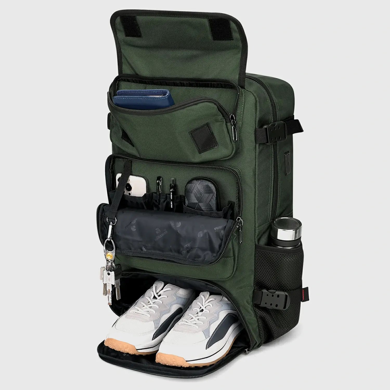 Army green travel backpack with separate shoe compartment and organizer pockets open