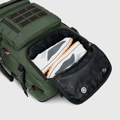 Close-up of separate shoe compartment in army green weekend travel backpack