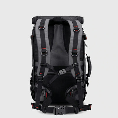 Side profile of silvery grey carry on backpack with structured multi-compartment design
