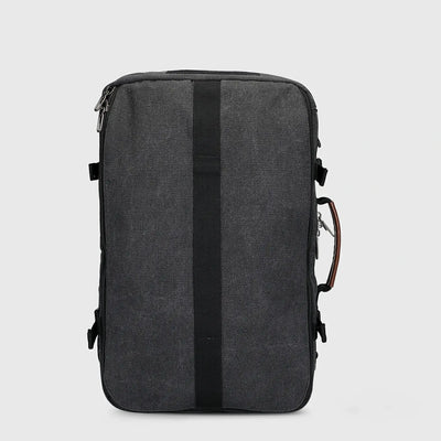 Side profile of WITZMAN black canvas carry-on backpack with structured 45L design