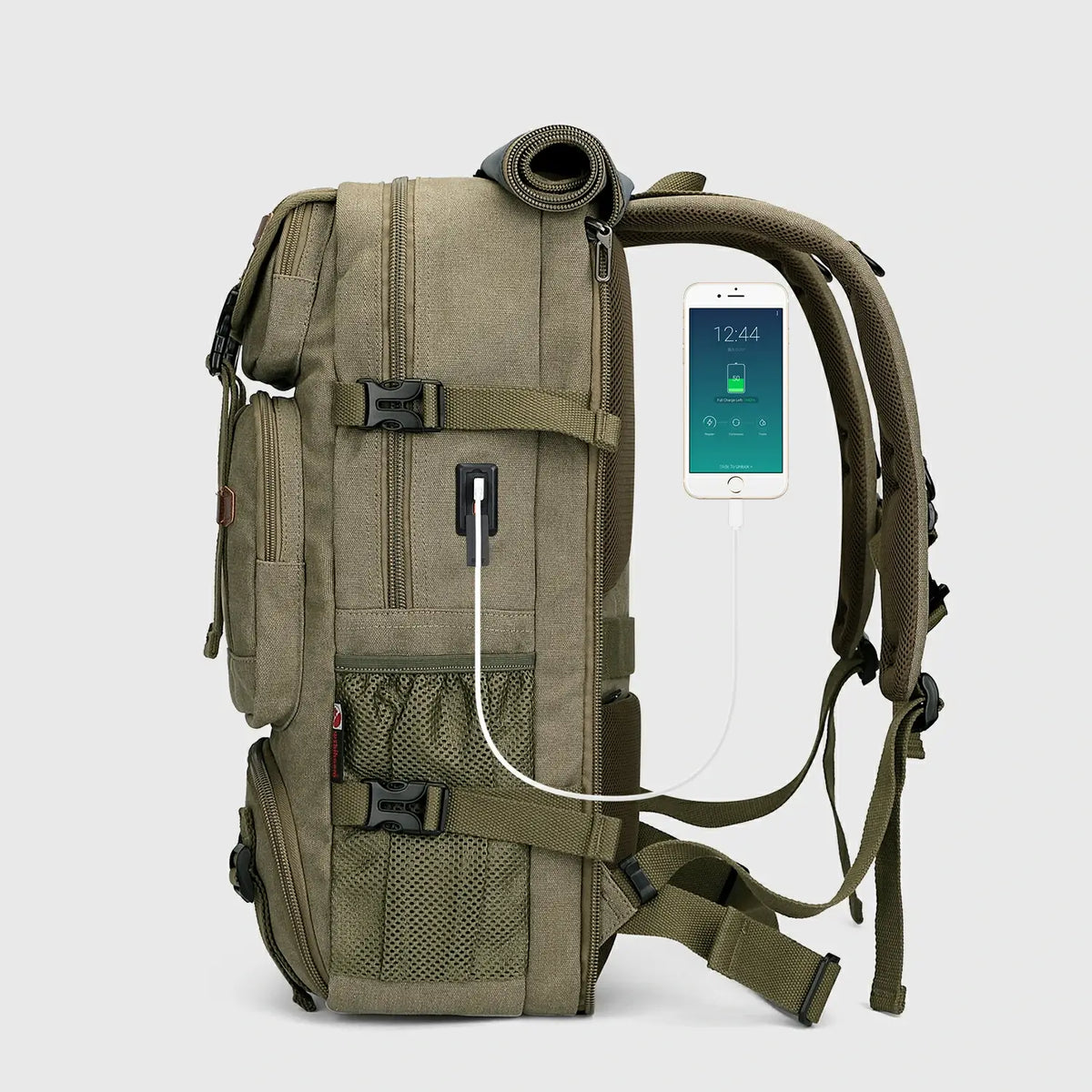 Side view of army green canvas travel backpack with USB charging port and padded straps