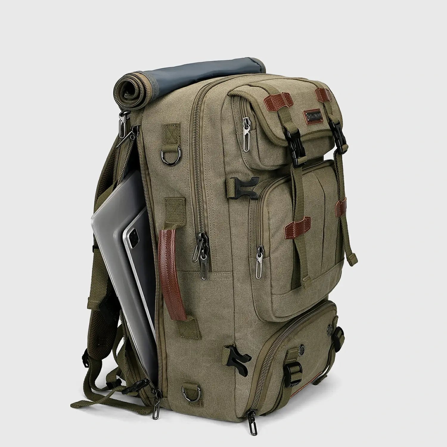 Three-quarter view of army green canvas travel backpack with multiple zippered pockets
